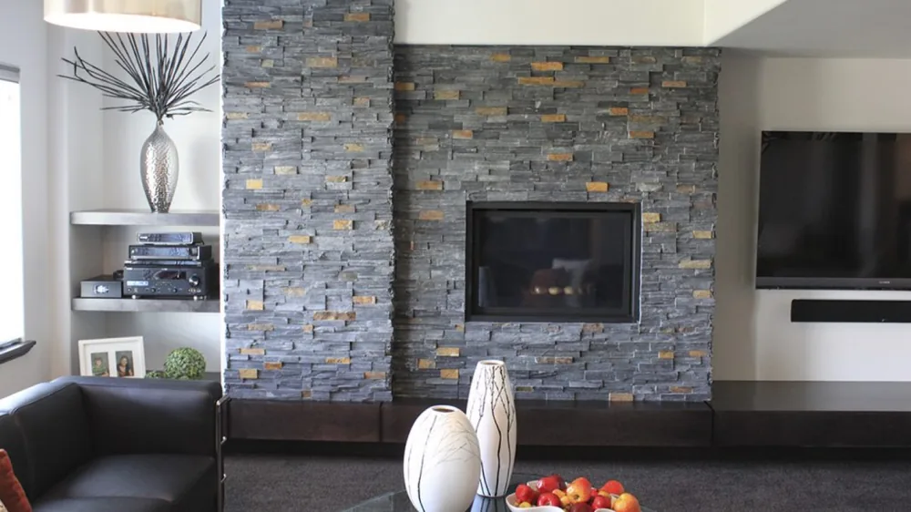 Grey ledger stone fireplace wall in a living room