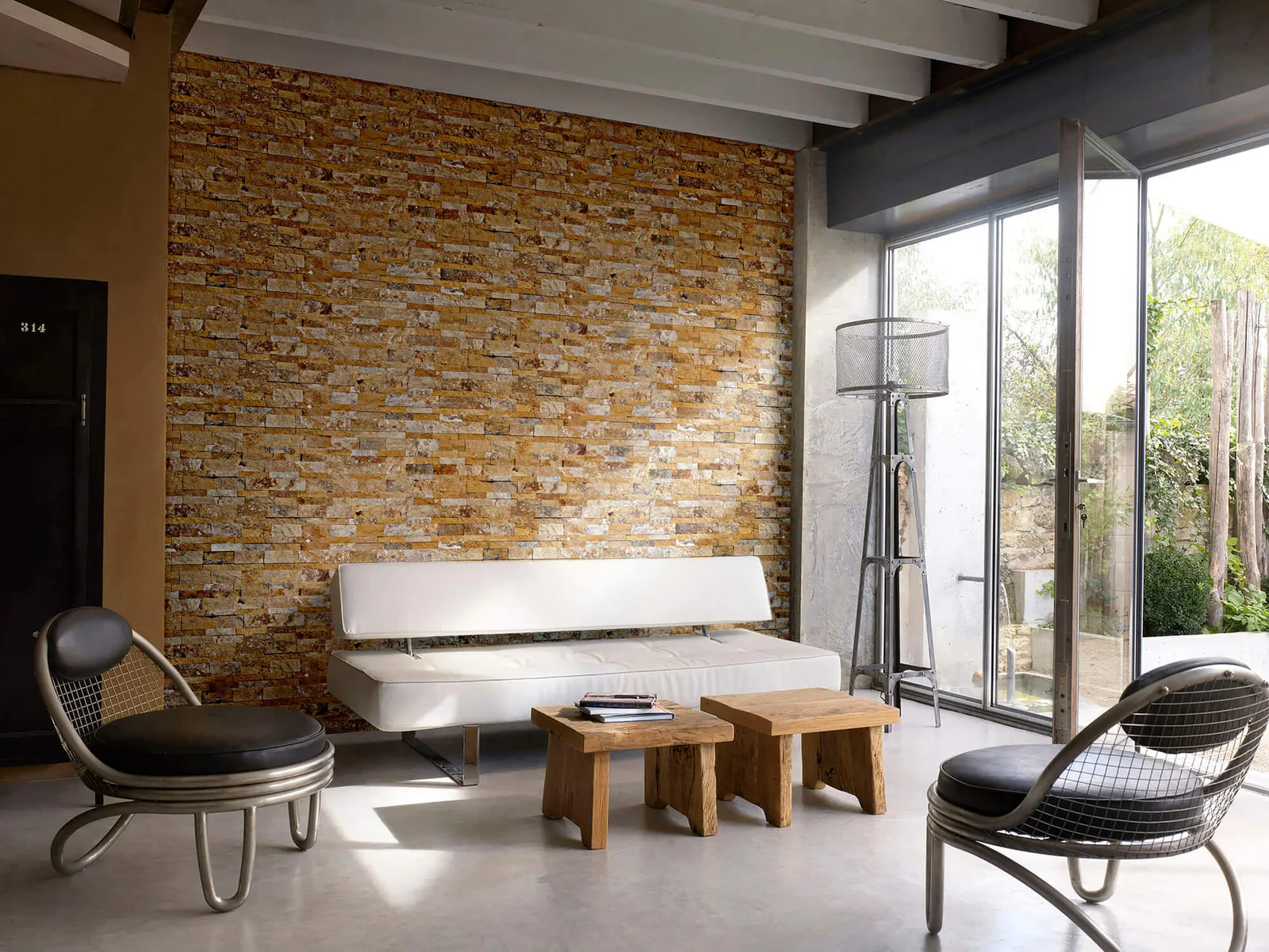 Gold travertine ledger panel wall in a lounge